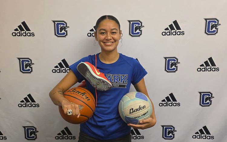 Mia Hicks-Oliver competes in track and field, basketball, and volleyball for Clark College. Here she also displays her Northwest championship ring. Last spring, she won the Northwest title in the heptathlon. Photo by Paul Valencia