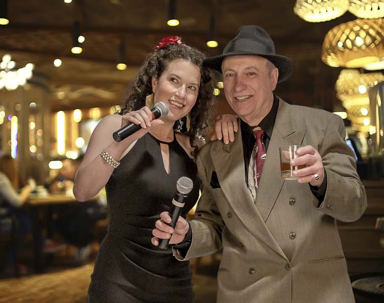 It’s four courses, twelve songs, a million laughs and one dead guy! Luigi Fishetti (played by Lou Pallotta) and Angela Fishetti (played by Dani Baldwin of Portland) along with the entire cast will entertain you as you enjoy dinner, singing and dancing at the beautiful Cedars Public House in Brush Prairie from November 21 through December 7. Tickets are available at lovestreetplayhouse.com. Photo courtesy Bobby Pallotta