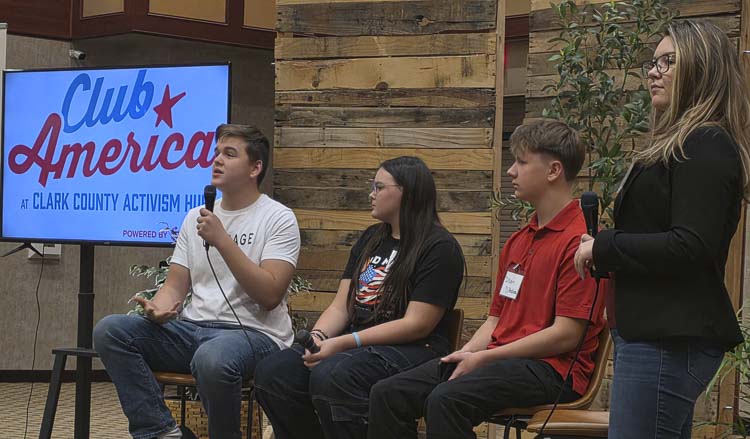 Logan Ruiz, left, talks about his experience with Club America, a brand of Turning Point USA that focuses on high school students, during an event in Vancouver on Tuesday. Also pictured are Ashley Ireton, Dillon D’Andrea, and on the right, Ruby Ruiz, the representative for Club American throughout Washington state. Photo by Paul Valencia