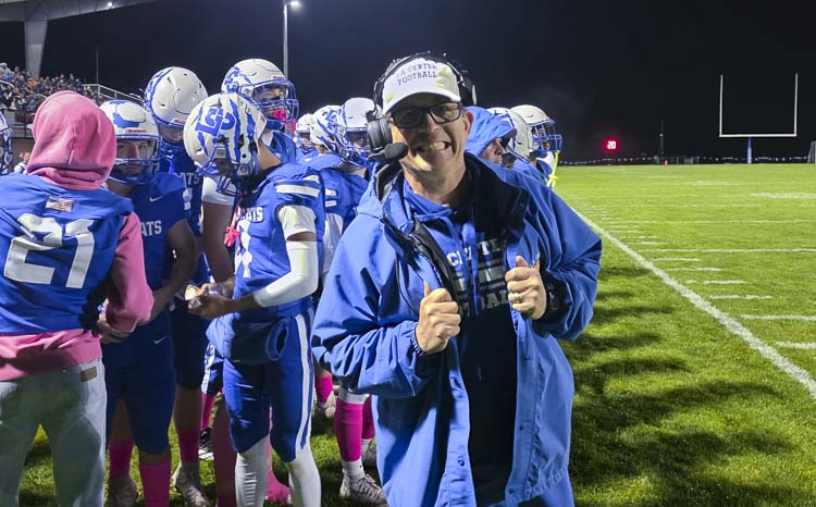 La Center coach John Lambert took a moment to flash a smile during Friday’s game. Photo by Paul Valencia