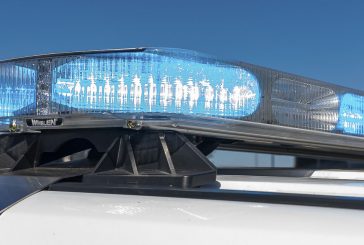 Driver rear-ends vehicle near protest