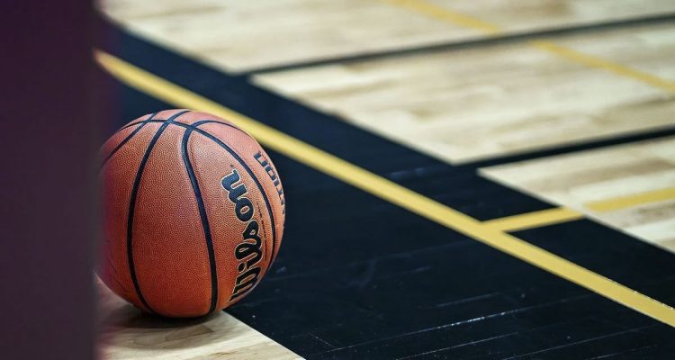 Federal authorities arrested 34 people, including NBA coach Chauncey Billups and player Terry Rozier, in a sports betting and poker fraud probe involving crime families and insider information.