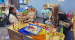 Ridgefield High School students in Anne Simms’ Child Development visited the Early Learning Center to apply classroom lessons, connect with preschoolers, and explore careers in education.