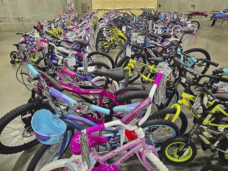 Scott Campbell’s dream is that every child in need receives a bicycle for Christmas. This photo was taken at the 2023 Bike Build event. Photo by Paul Valencia