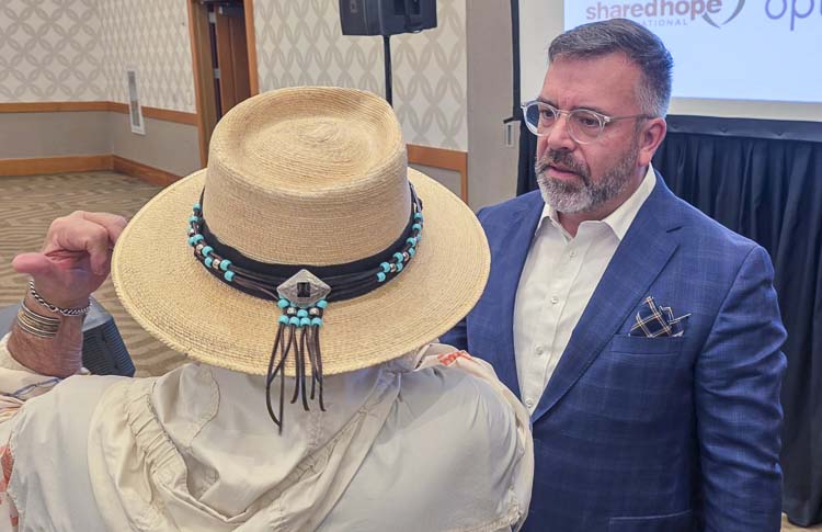 Dr. John Mark Yeats, the keynote speaker at the Clark County Prayer Breakfast, talks to an attendee after Thursday’s event in downtown Vancouver. Photo by Paul Valencia