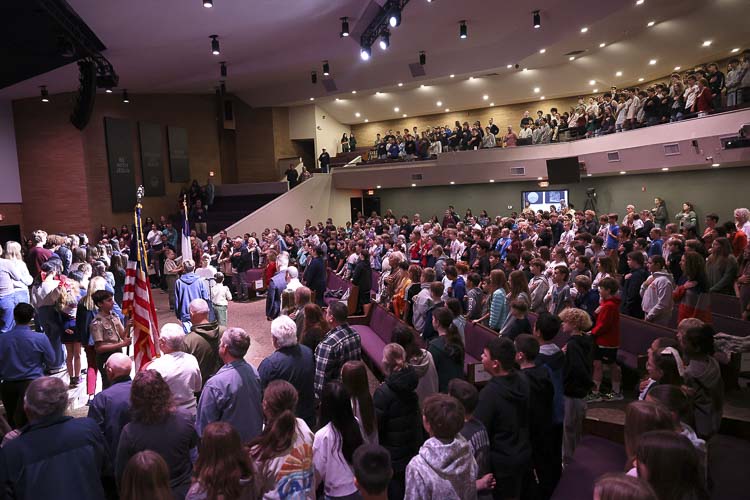 A large crowd gathers for one of two Veterans Day assemblies at King’s Way Christian Schools on Friday. Photo courtesy Paris Shewey