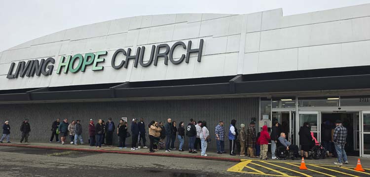 A line formed outside Living Hope Church for the Dream for Life Thanksgiving meal on Saturday. Organizers expected to feed thousands. Photo by Paul Valencia
