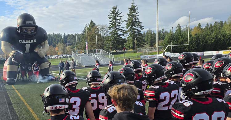 Camas football players during pre-game intros Saturday before their state playoff game with Skyline. Photo by Paul Valencia