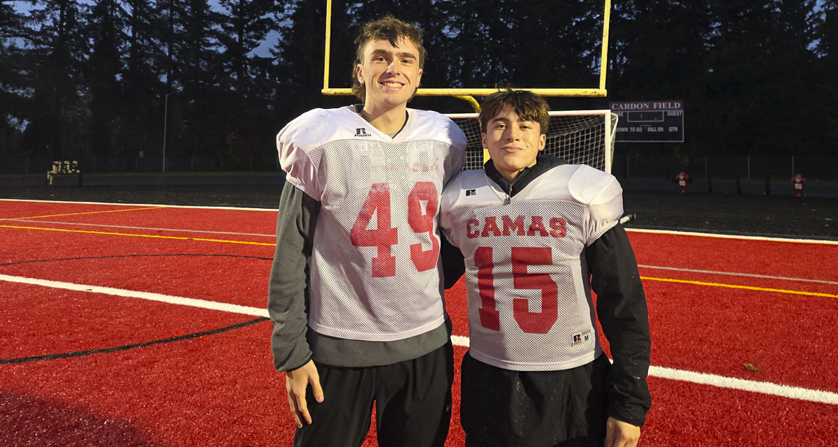 Camas seniors Jackson Tyler and Carter Pak share kicking duties and support each other as the Papermakers claim the Class 4A GSHL football title.