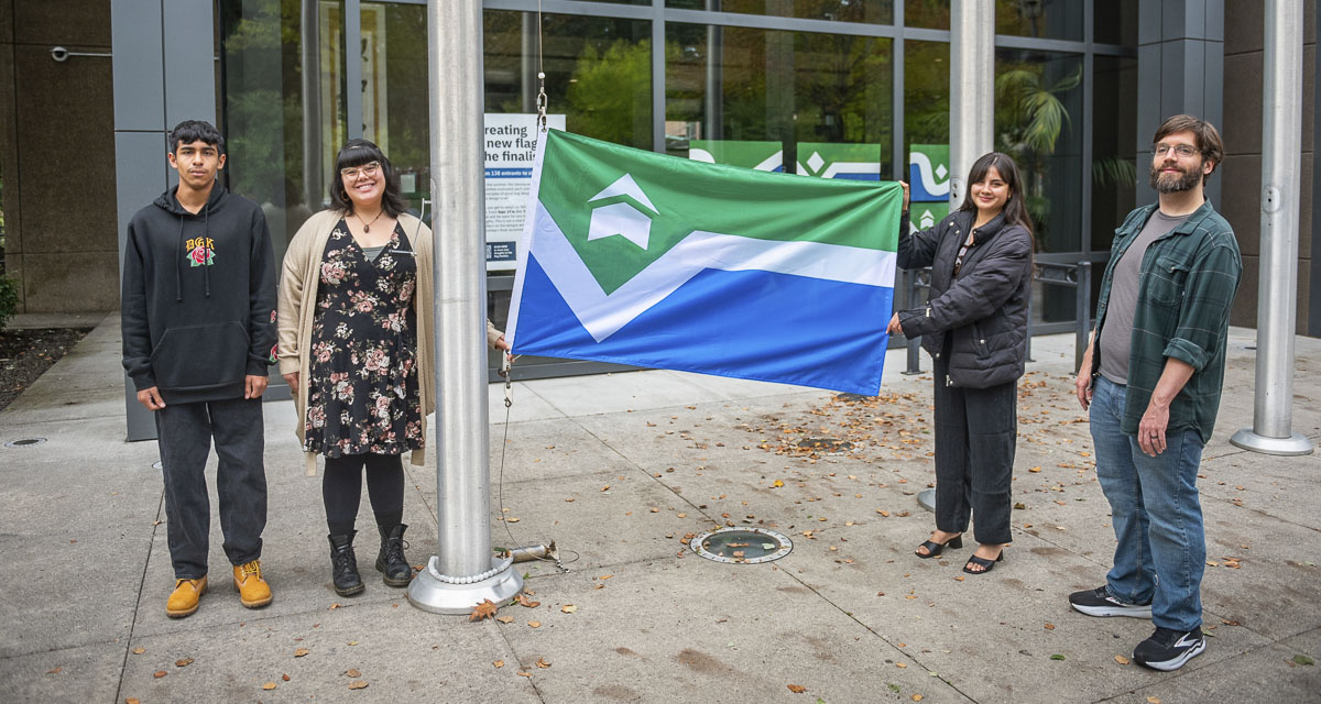 The Vancouver City Council has adopted a new community flag featuring designs by Brooke Nugent and Nathan Hunter, which will be introduced during a Nov. 28 event at City Hall.