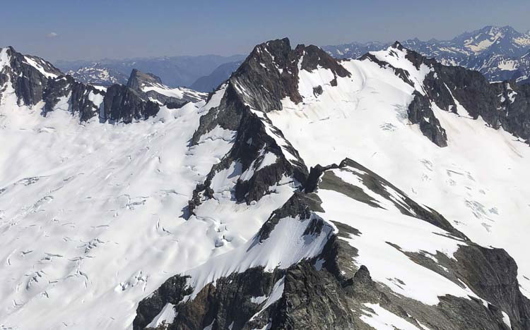 The Boston Glacier, left, viewed from Forbidden Peak, falls away from Boston Peak in the North Cascades. Boston Basin to the right. Photo courtesy Bill Lucia/Washington State Standard