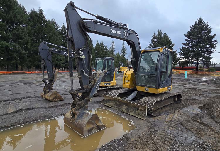 Organizers weren’t kidding when they called it a Muddy Boots Tour, a celebration of the construction of Bridge Shelter in Vancouver. Photo by Paul Valencia