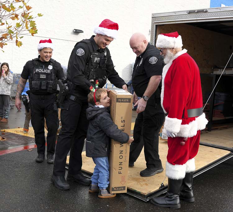 BGPD and Walmart bike surprise. Photo courtesy city of Battle Ground