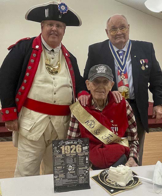 Alfred Folkerts, a member of the Fort Vancouver Chapter of the Sons of the American Revolution, was recognized by the chapter on Saturday. Folkerts is a World War II veteran and recently celebrated his 100th birthday. With Folkerts is Jeff Lightburn, former president of the chapter, and John Russell, current president. Photo courtesy SAR.