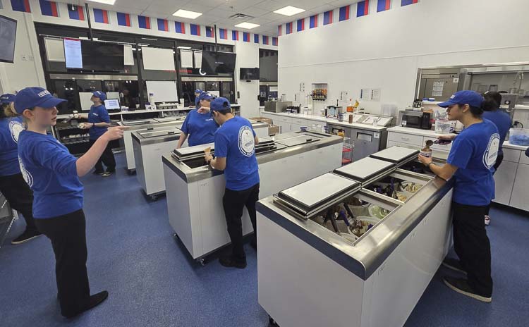 Employees at Handel’s work the shop during the soft opening this week. Handel’s Ice Cream, which was founded in 1945 in Ohio, is opening its first shop in Washington, in east Vancouver. Photo by Paul Valencia