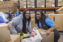 Kaiser Permanente employees volunteer at Clark County Food Bank on MLK Jr. Day