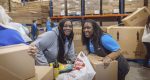 Kaiser Permanente employees volunteered at the Clark County Food Bank on Martin Luther King Jr. Day, inspecting and repacking food as part of a regional day of service.