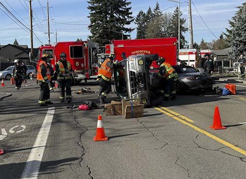 Fire crews extricated a trapped occupant from a rollover crash on Burton Road and transported both patients with non-life-threatening injuries.