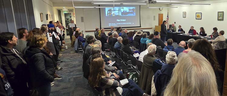 There were not enough chairs for those attending the Fort Vancouver Regional Libraries Board of Trustees meeting on Tuesday in east Vancouver. Photo by Paul Valencia