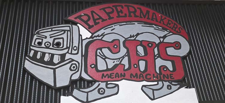 The Camas Mean Machine looks over the gymnasium at Camas High School. The school was announced as one of the Opening Round sites for state basketball and will host four Clark County teams this week in playoff games. Photo by Paul Valencia