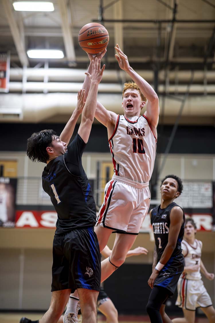 Ethan Harris is ready for the final weeks of his last high school basketball season, leading the Camas Papermakers. The Class 4A boys playoffs started Friday night. Camas defeated Curtis. Photo courtesy Heather Tianen