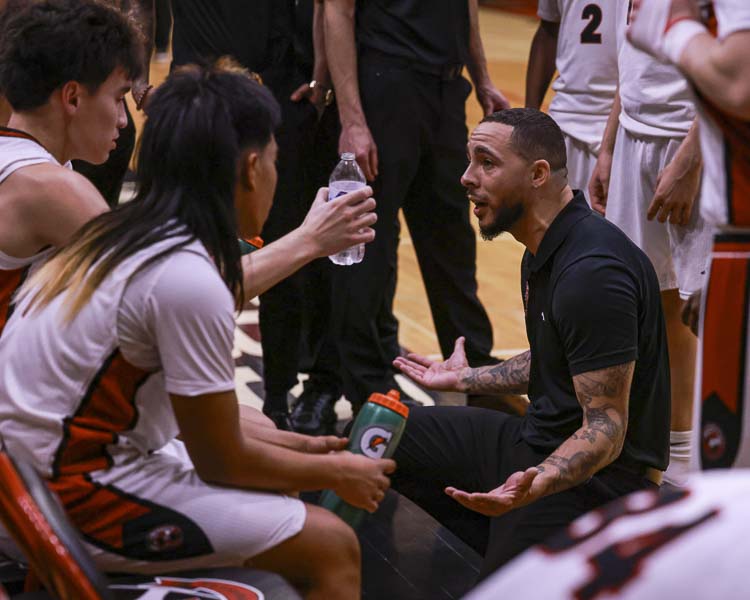 Fort Vancouver coach James Jones gives his team some instruction during Friday’s state playoff game. Photo courtesy Chris Barker