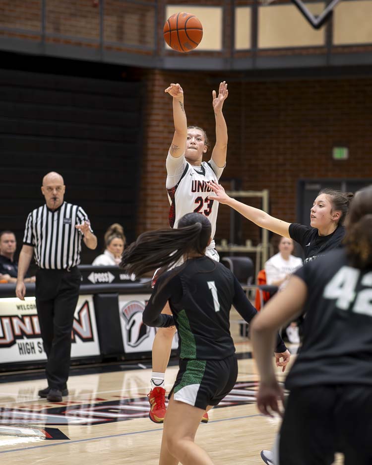Brooklynn Haywood is looking to make history in her final season of high school basketball, leading the Union Titans into the playoffs. The Class 4A girls postseason started Thursday. Union defeated Kentwood. Photo courtesy Heather Tianen