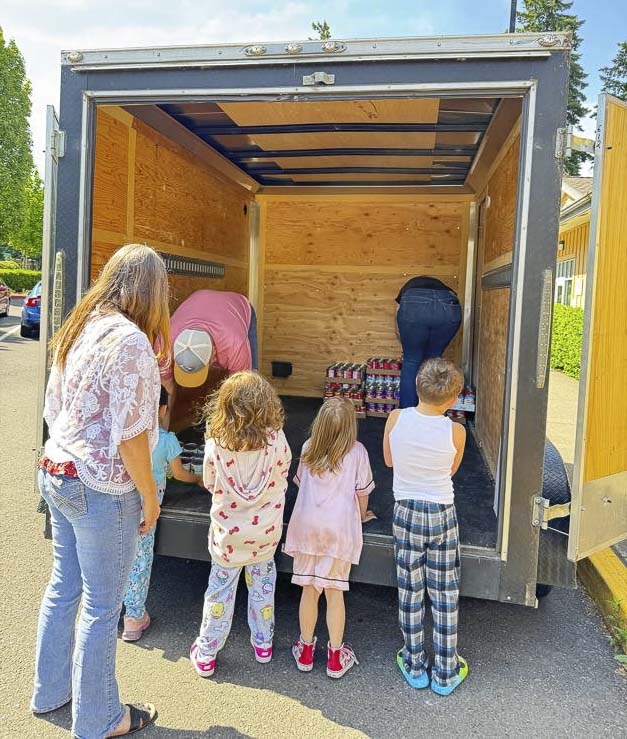 Windermere Northwest Living brokers hosted a food drive last year for Fruit Valley Elementary School families. Photo courtesy Winderemere Real Estate Vancouver