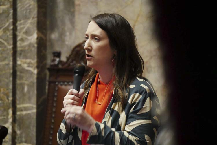 State Sen. Noel Frame, D-Seattle, speaks on the Senate floor during Monday’s debate on the income tax bill. Photo courtesy Bill Lucia/Washington State Standard