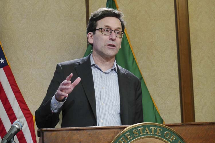Gov. Bob Ferguson speaks to reporters during a press conference at the state Capitol on Tuesday. Photo courtesy Bill Lucia/Washington State Standard
