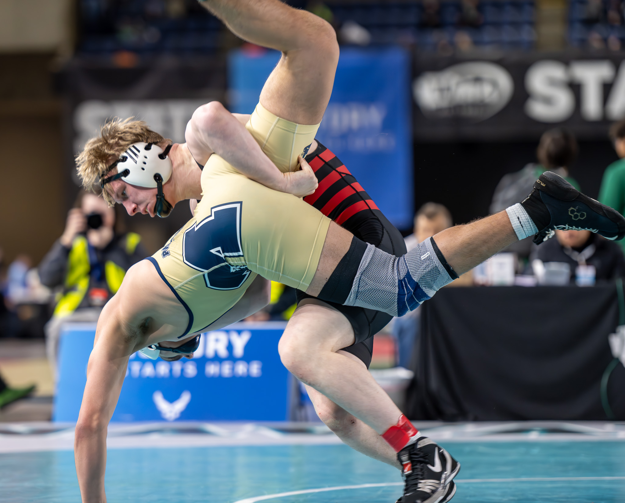 Kannon Freschette of Camas takes down his opponent during the Class 4A 190-pound state championship match Friday in Tacoma. Freschette won the title. Photo courtesy Allison Faussete