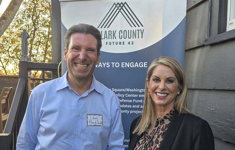 Dann Mead Smith, a co-founder of Project 42, and Leslie Lewallen, director of the Clark County Chapter of Future 42, discussed ways for citizens to challenge the state’s new income tax law during a gathering Monday night in Battle Ground. Photo by Paul Valencia