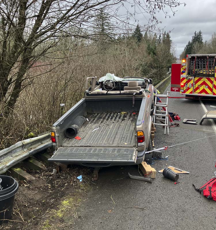 A pickup truck hit a guardrail and then high-centered on a Jersey barrier Friday morning on NE 72nd Avenue in Vancouver. Photo courtesy Clark County Sheriff’s Office