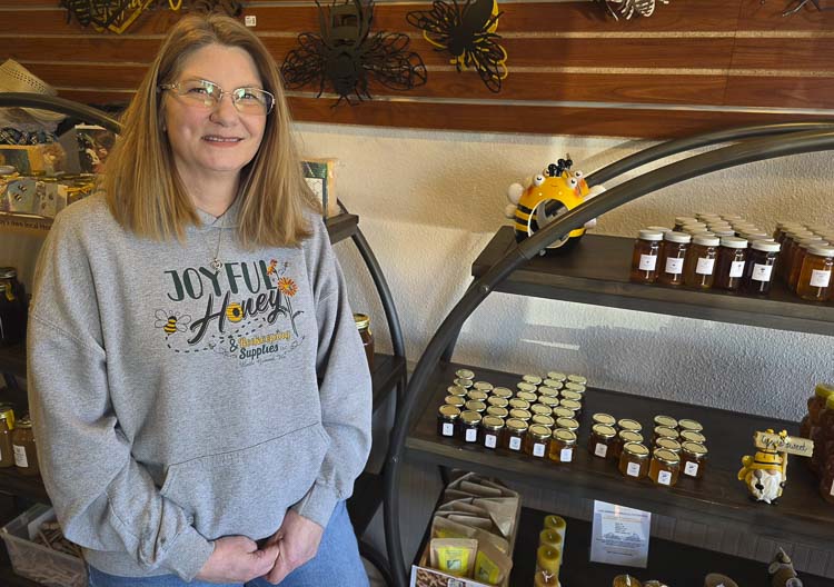 Joy Bochsler has decades of experience as a beekeeper, and she opened a store for “all things bee related” in Battle Ground called Joyful Honey and Beekeeping Supplies. Photo by Paul Valencia