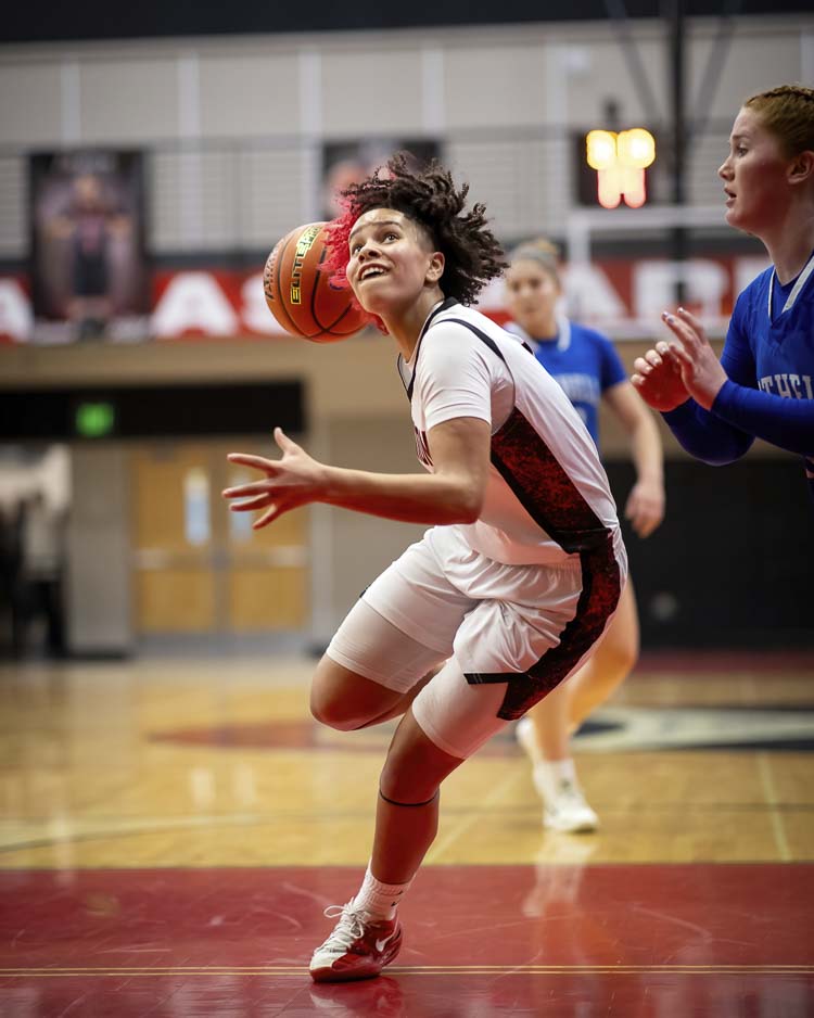 Myla Larry scored 10 of her 18 points in the decisive third quarter Saturday, leading Union to a win over Bothell in the Class 4A state girls basketball tournament. Union has advanced to the quarterfinals and will play this week in the Tacoma Dome. Photo courtesy Heather Tianen