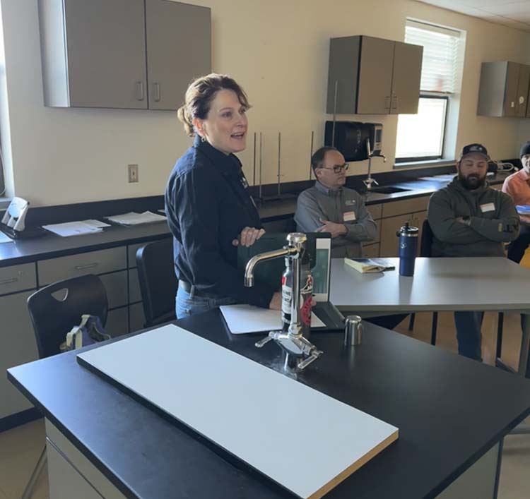 Zeecha Van Hoose with Clark Public Utilities listens and responds to student ideas. Photo courtesy Washougal School District