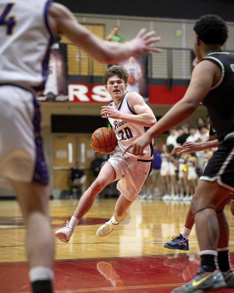 Columbia River’s Luca Phillips led a balanced scoring attack for the Rapids, scoring 19 points in the team’s victory over Clover Park on Saturday at Camas High School. Photo courtesy Heather Tianen