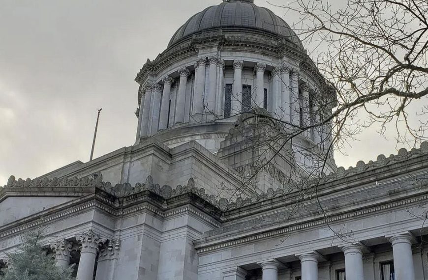 Washington lawmakers narrowly approved a new income tax on households earning over $1 million, setting the stage for court battles and a statewide initiative campaign.