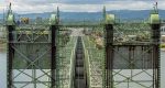 A $14.4 billion price tag prompts Washington and Oregon leaders to delay portions of the I-5 bridge project and prioritize just the main spans.