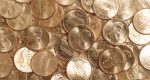 A new Washington law lets merchants round cash purchases to the nearest 5 cents, aiming to manage change as shortages of pennies affect both businesses and customers.