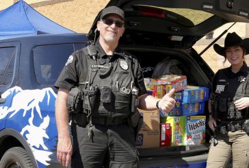 Community in Action: Police cruisers ‘crammed’ with snacks to benefit local students