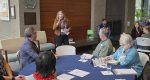 Guests filled six tables as Vancouver officials listened to conversations sparked by structured questions touching on connection, barriers, and belonging.