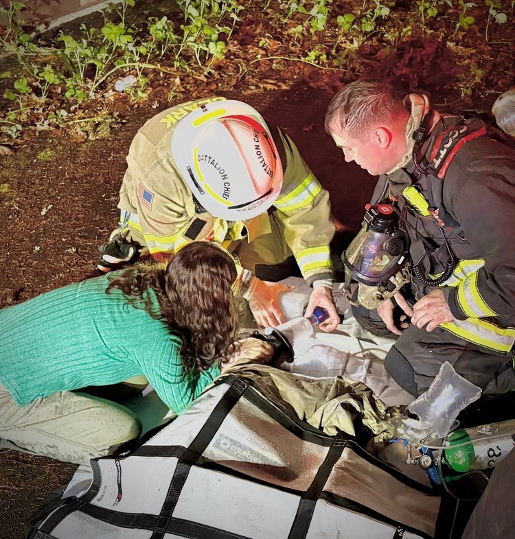 Firefighters located and rescued two dogs and two cats from inside the residence. All four animals were quickly removed from the structure, and crews began emergency resuscitation efforts on scene. Photo courtesy Vancouver Fire Department