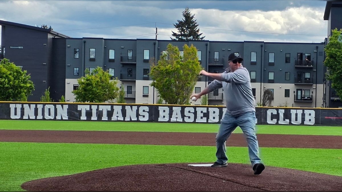 Baseball and softball teams combined efforts to recognize military heroes and first responders with ceremonial pitches.