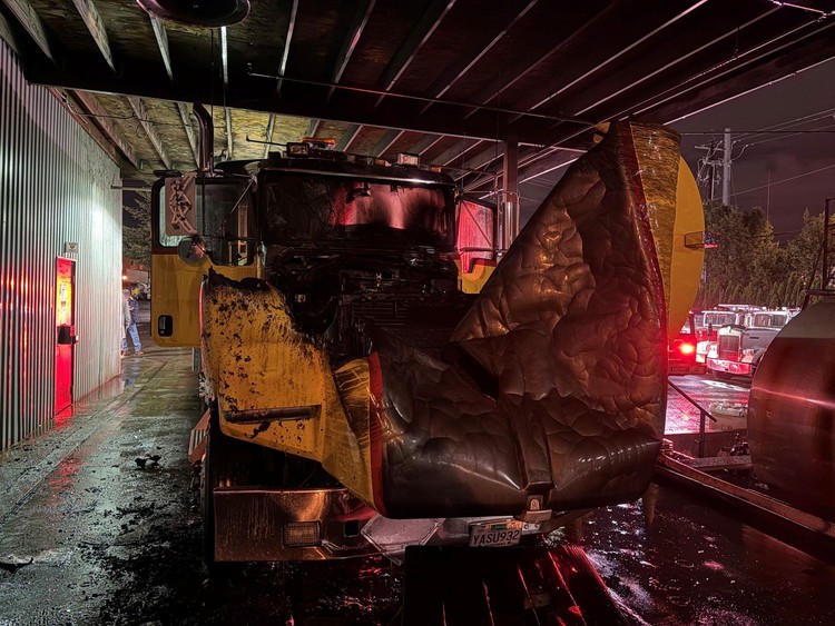 Sprinklers held the blaze in check at 1200 W. 8th St. until Vancouver Fire crews fully extinguished the burning commercial truck.