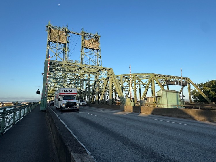 Stantec's investment-grade study projects I-5 traffic dropping from 127,000 to 77,000 vehicles per day once tolls begin.