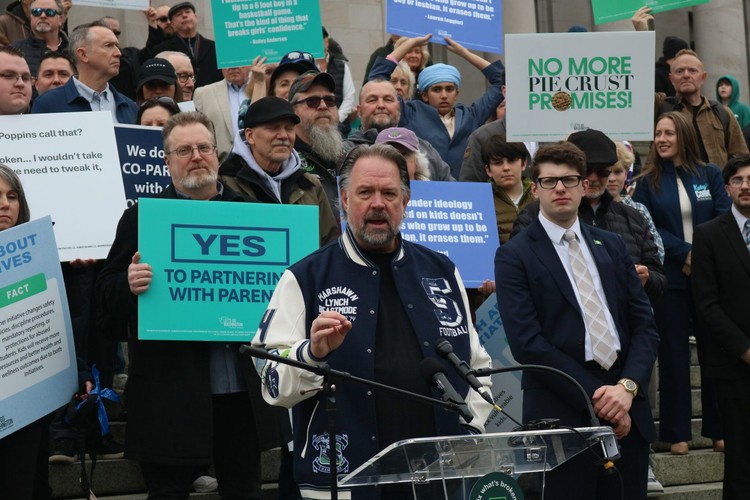 Let’s Go Washington founder Brian Heywood speaks to supporters of his group’s initiatives to bolster parental rights and block transgender athletes from girls’ sports, at the Washington state Capitol, Tuesday, Feb. 3, 2026. Photo courtesy Aspen Ford/Washington State Standard