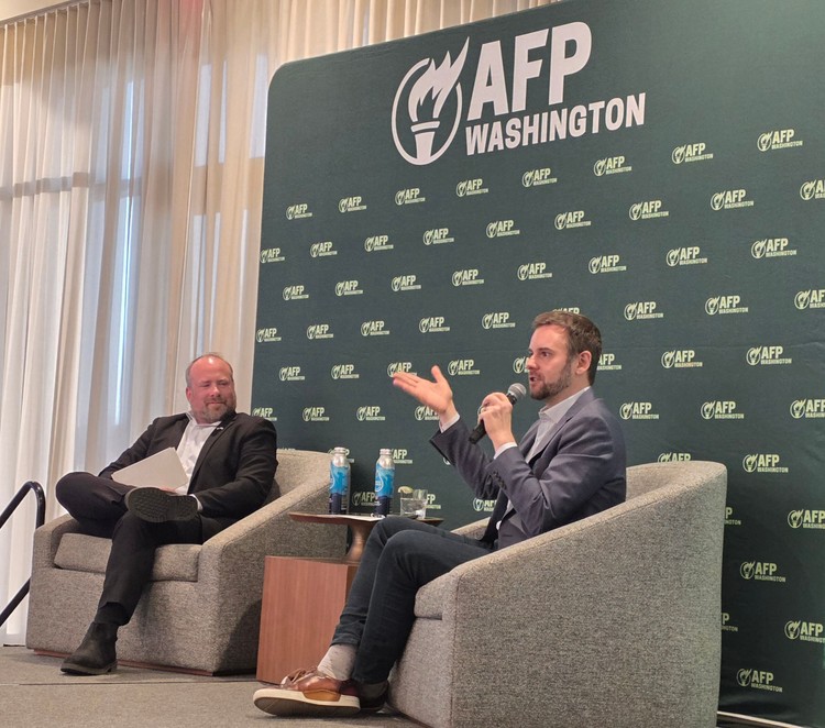 Guy Benson, right, who hosts his own national syndicated radio show and is a contributor with Fox News, answers a question from Ari Hoffman, a Seattle radio host at the AC Hotel Vancouver Waterfront in Vancouver on Thursday. Photo by Paul Valencia