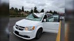 A detached semi-truck tire struck a southbound minivan on I-5, sending the driver to a local hospital with moderate injuries.