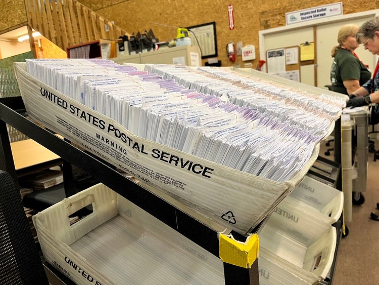 Ballot envelopes sit in the Thurston County elections center.